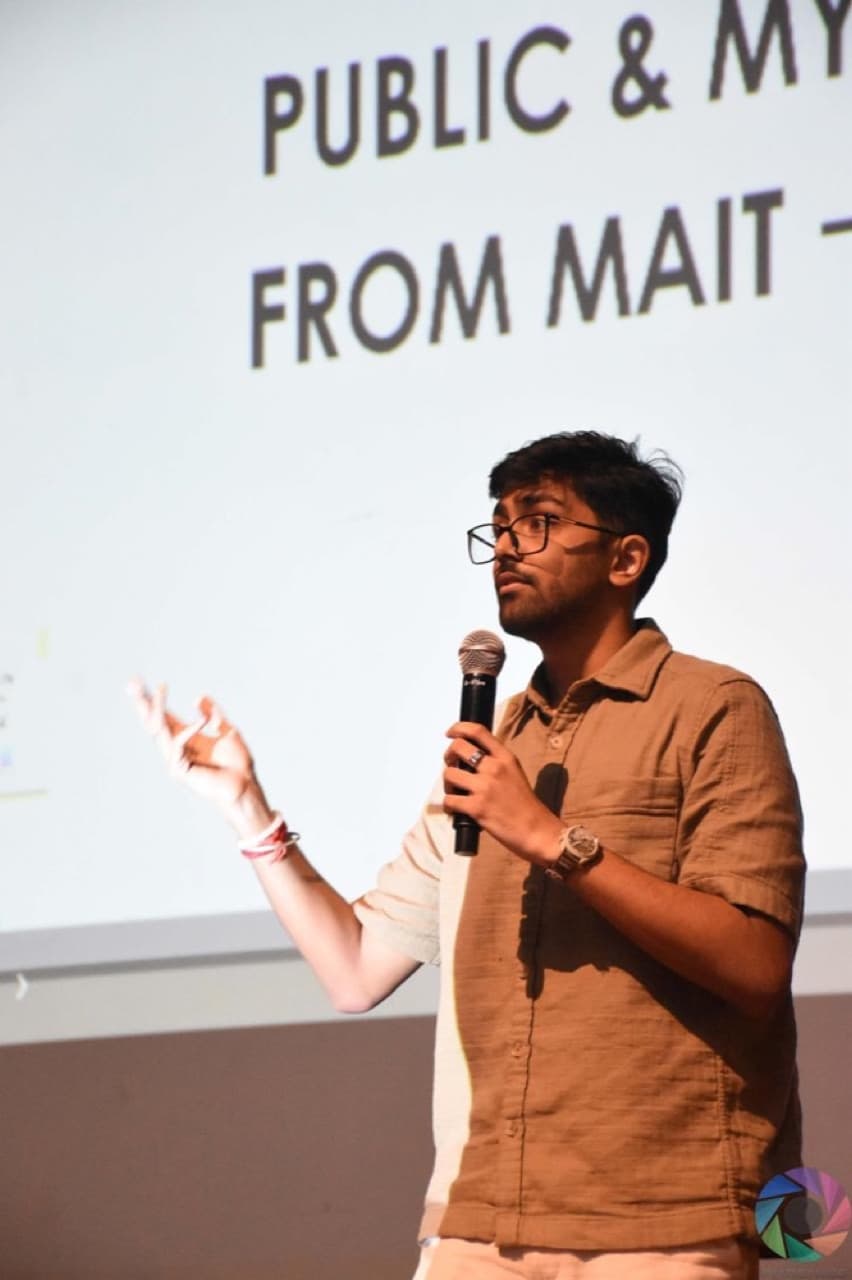 A zerith teammate speaking on stage